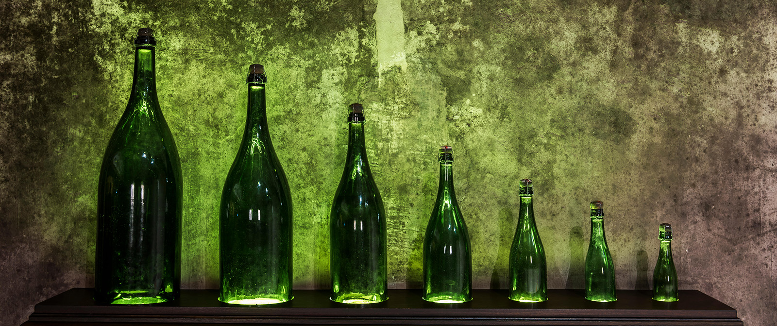 Uncover the world of wine bottle sizes! From splits to Nebuchadnezzars, let's uncork the mystery behind their names and capacities. Cheers to knowledge!