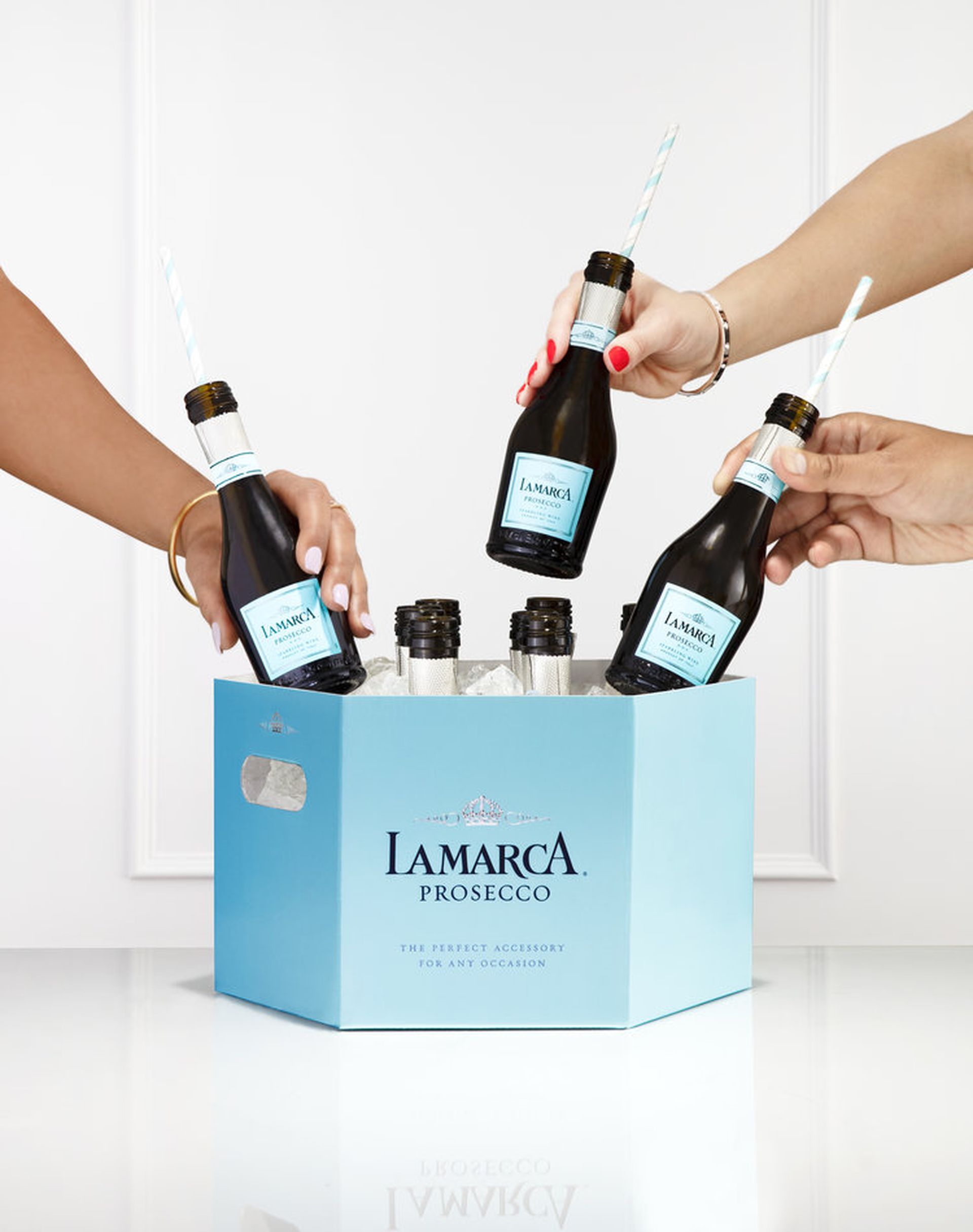 Lamarca Wine hand taking lamarca wine from a box