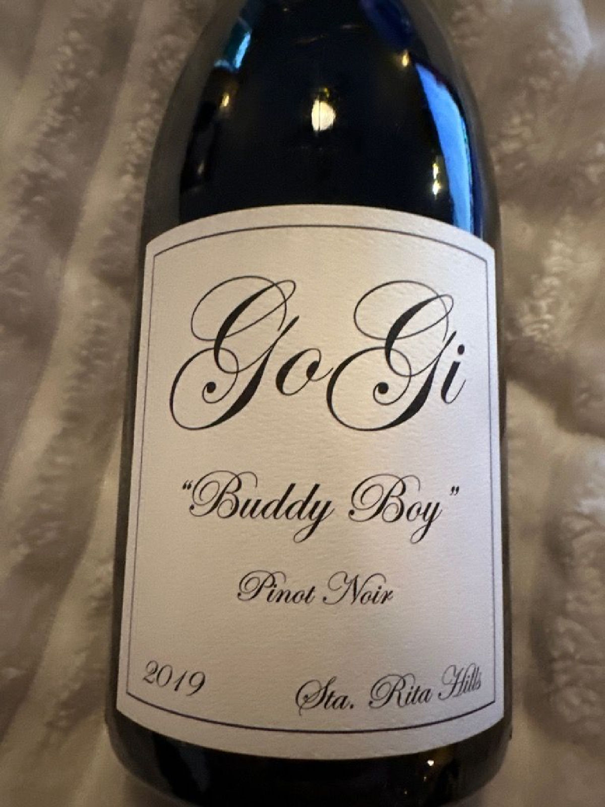 "Elegant bottle of Gogi Wine, perfectly embodying the rich taste and heritage of Gogi Wine, by Kurt Rusell