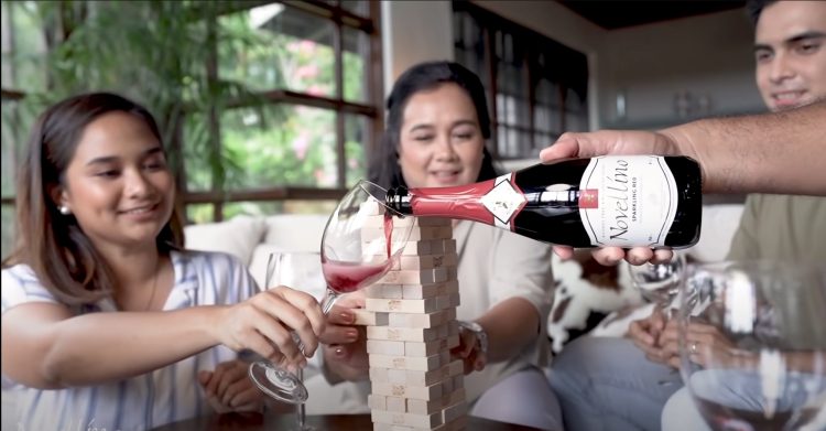 "A luxurious bottle of Novellino Wine set against a backdrop of the vibrant Philippine wine scene, highlighting the elegance and revolution in wine appreciation.