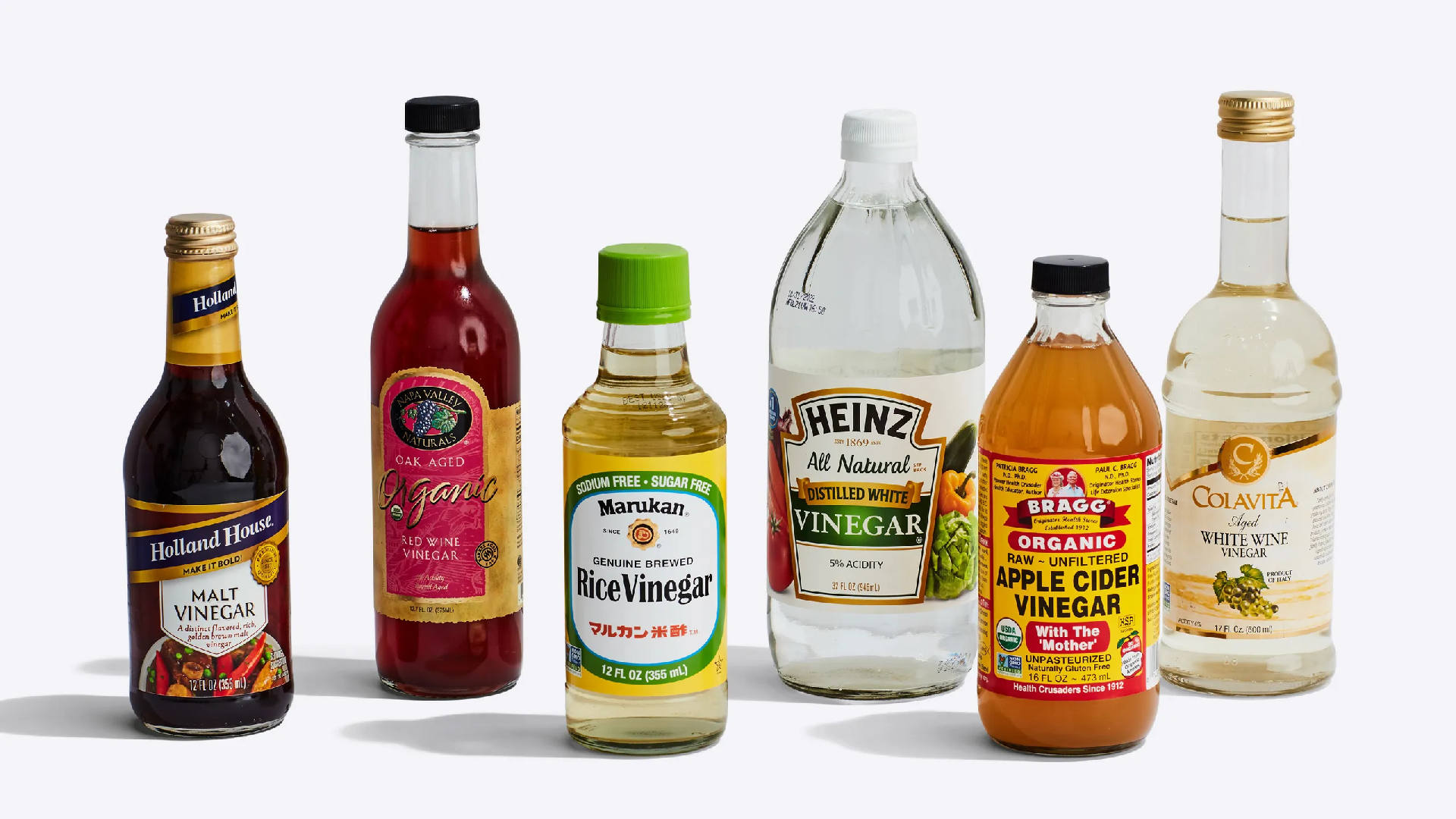 A selection of Rice Wine Vinegar Substitutes displayed on a kitchen countertop, ready to transform any recipe with their unique flavors and culinary potential.